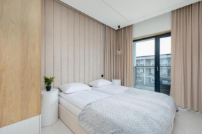 Nowoczesny Apartament Przy Plaży z Parkingiem by Noclegi Renters in Ustronie Morskie